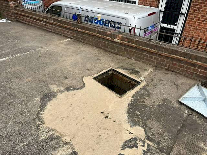 preparation planing out of keyways raising of manhole covers emulsion area and regulate tarmac overlay of 220m2 area @40mm depth using 10mm sma waring course